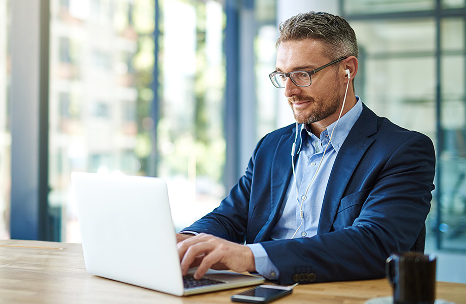 Student studying online with laptop